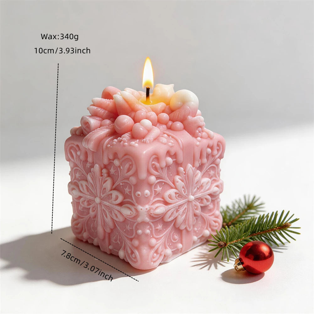 Christmas present candle measuring 10 centimetres tall