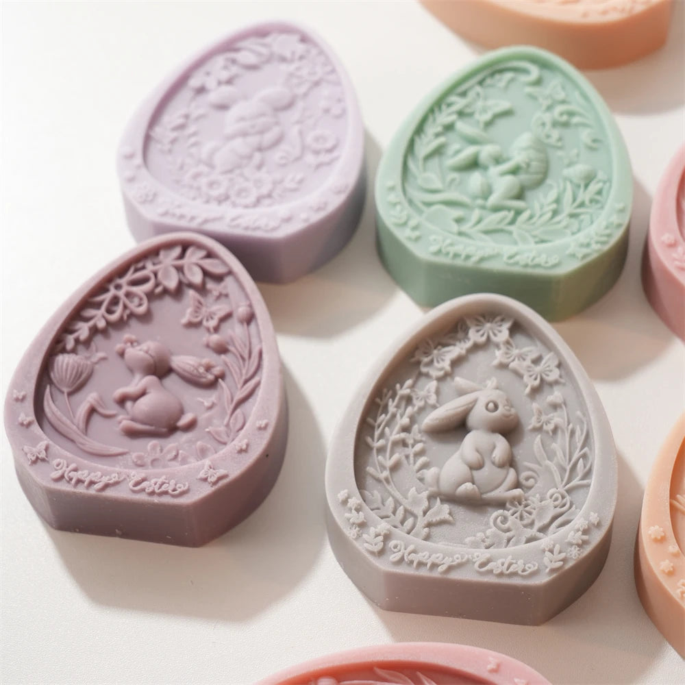 Decorative soap bars with rabbit designs on a light background