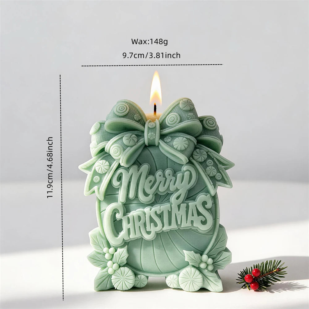 Merry Christmas plaque candle measuring 11.9 centimetres tall