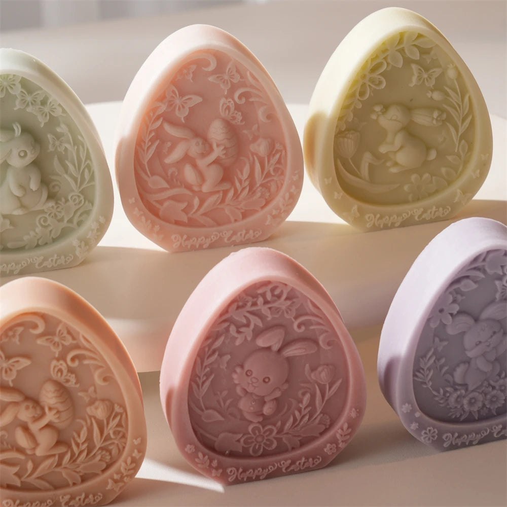 Decorative soaps with embossed designs on a light background