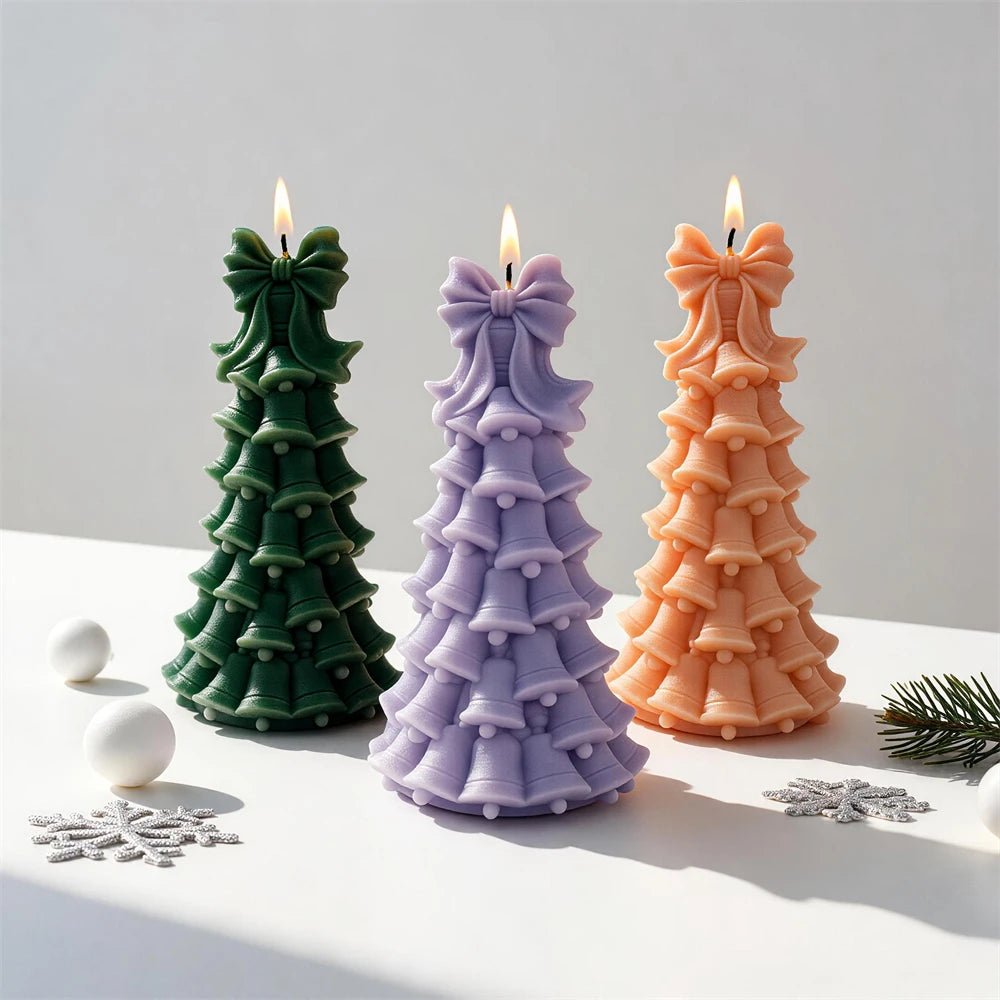 Christmas tree candle made from layered bells and small ornament details
