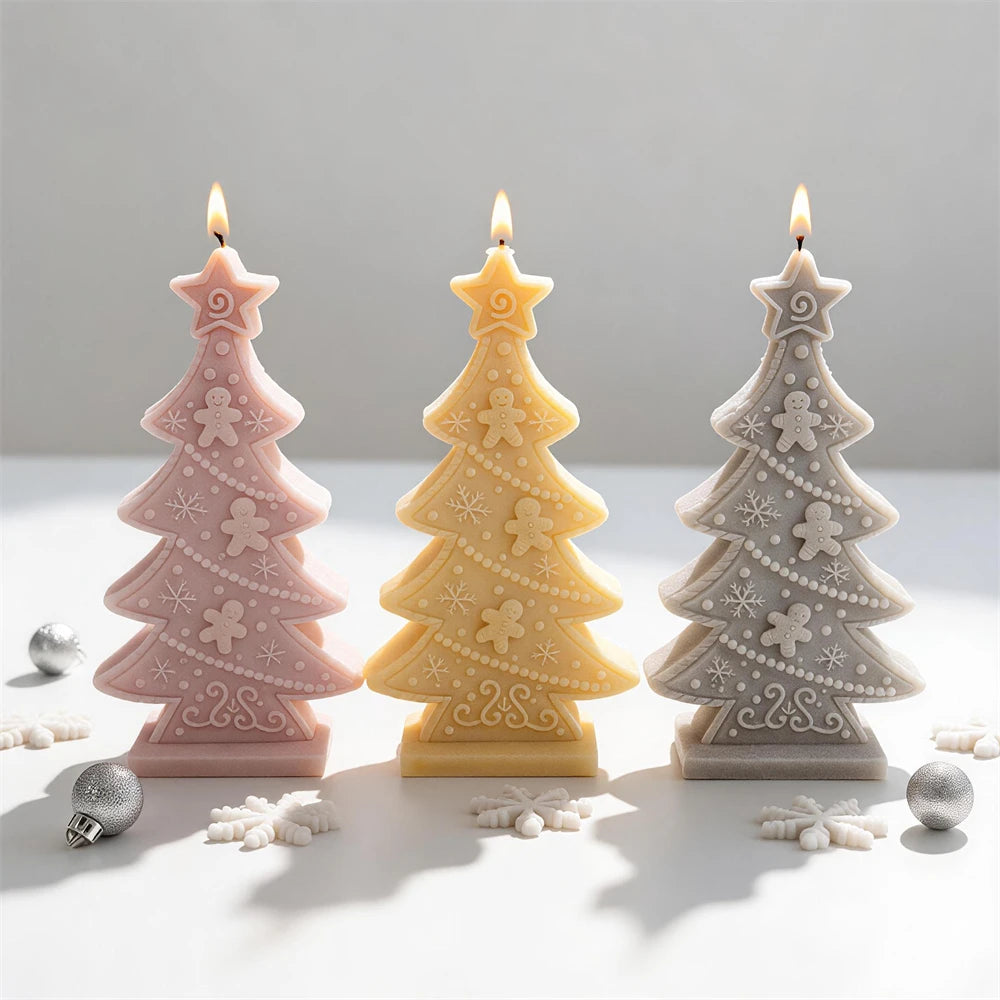 Slim gingerbread tree candle with raised snowflakes scrollwork and cookie figures