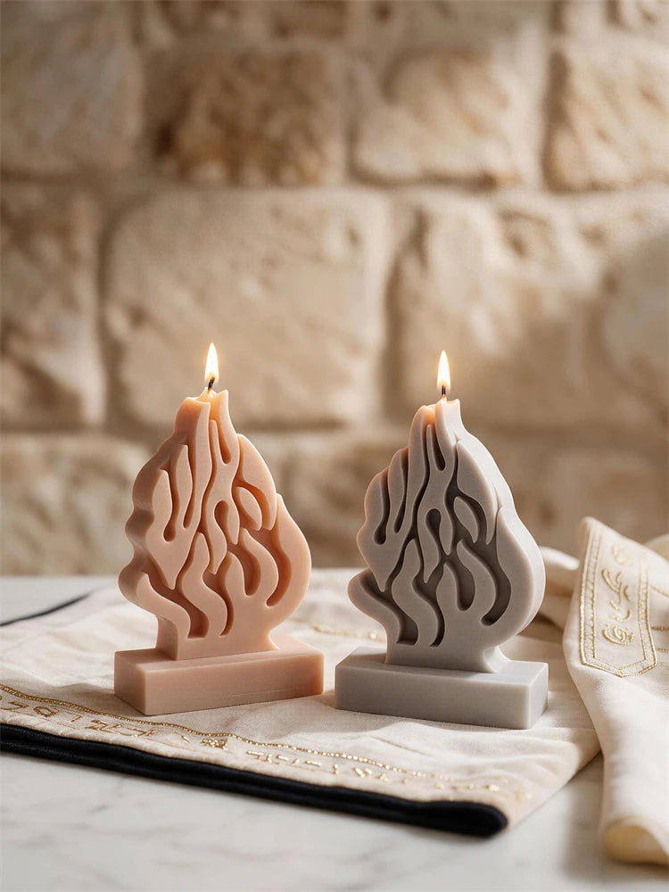 HaEsh Sheli flame candles in beige and gray on rectangular pedestal bases