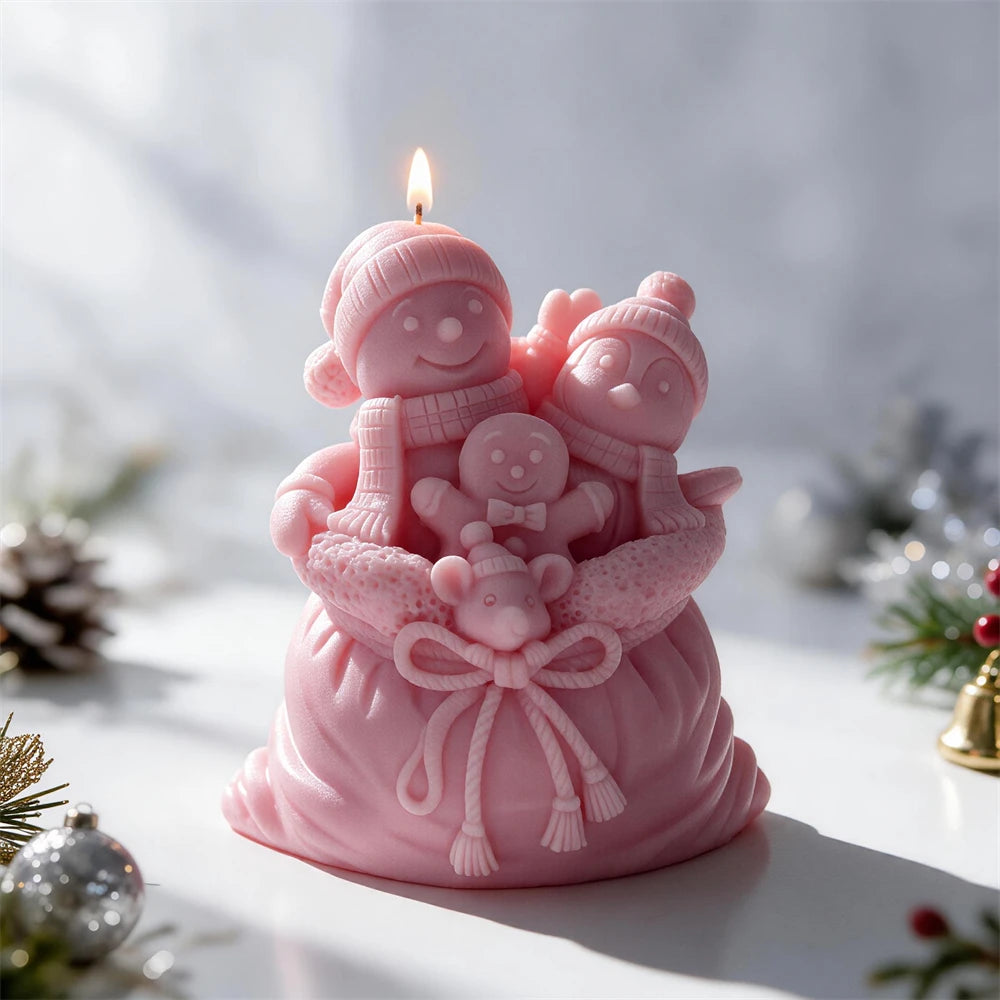 Two snowmen and gingerbread man silicone candle mold design