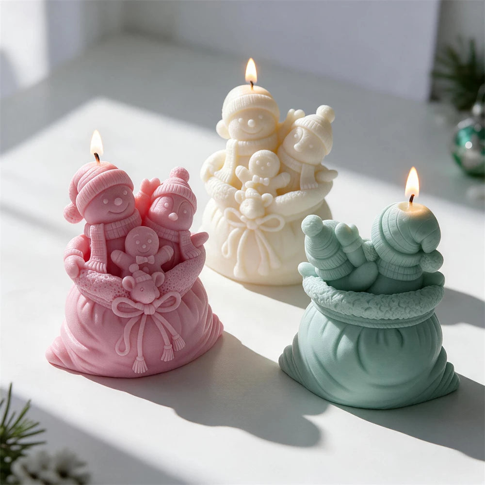Christmas gift sack candle with snowmen, gingerbread man and toy details