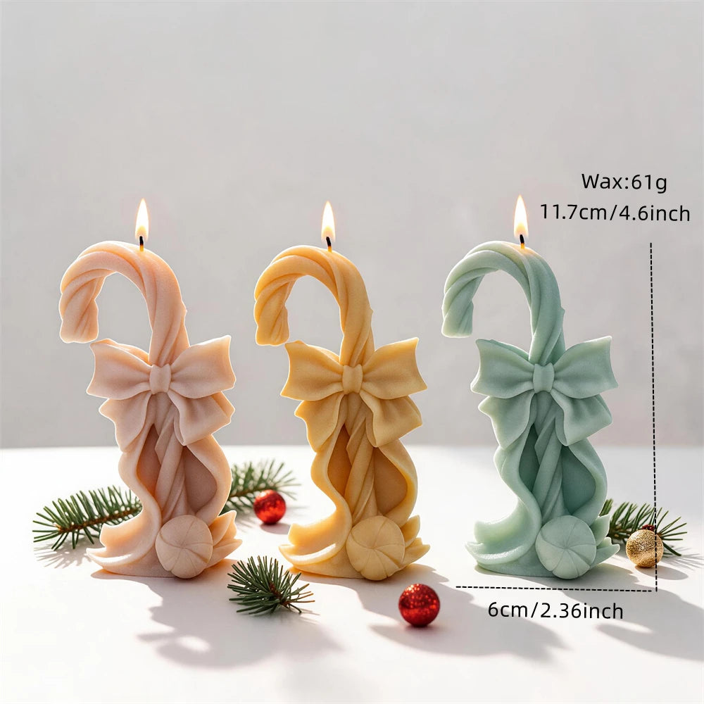 Standing candy cane candle measuring 11.7 centimetres tall