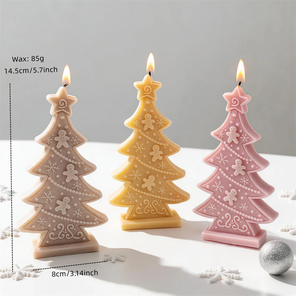 Christmas tree candle measuring 14.5 centimetres tall with star topper