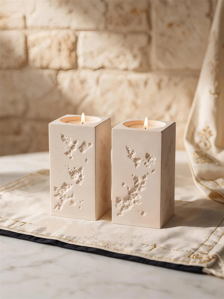 Tall and short square tea light holders with distressed stone-style texture