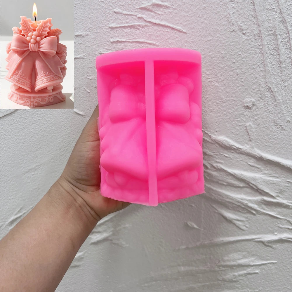Twin Christmas bells silicone candle mold with decorative ribbon and berries