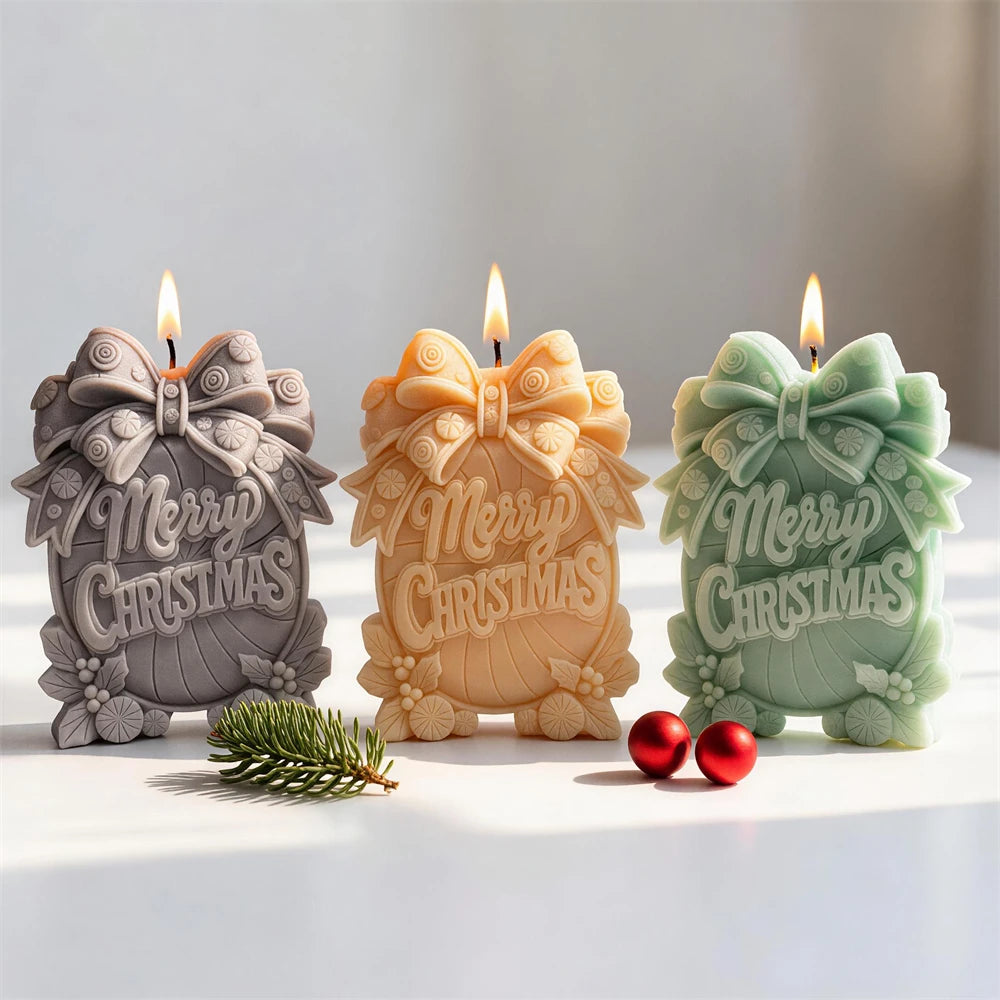 Merry Christmas bow plaque candles with raised festive lettering