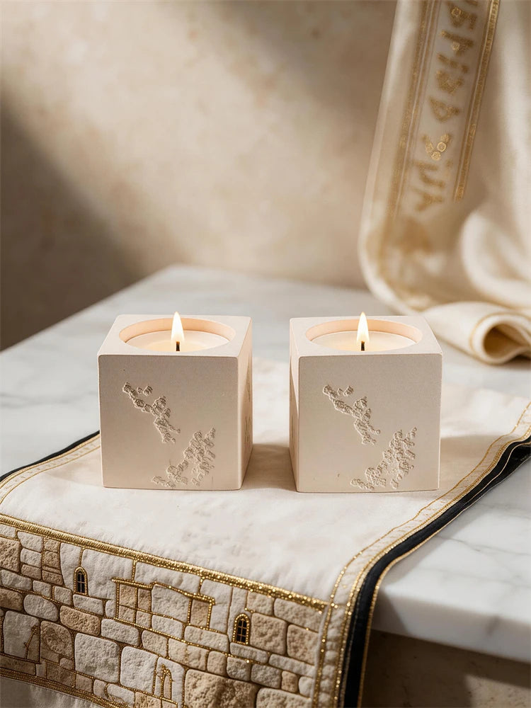 Tall and short square tea light holders with distressed stone-style texture