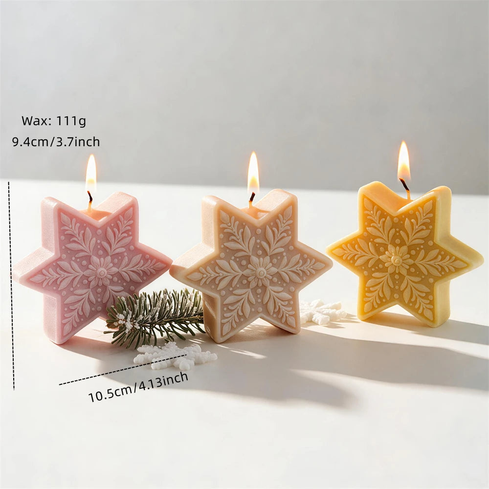 Six-point Christmas star candle measuring 10.5 centimetres wide