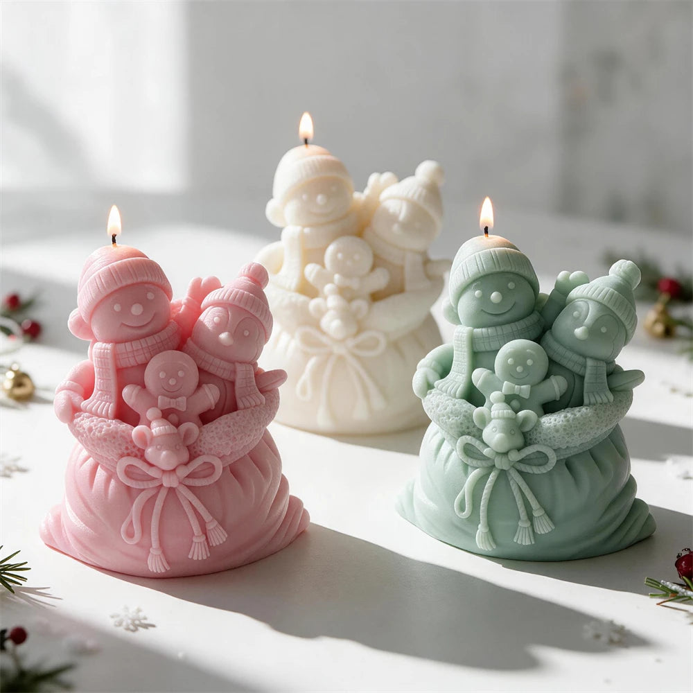 Christmas gift sack candle with snowmen, gingerbread man and toy details