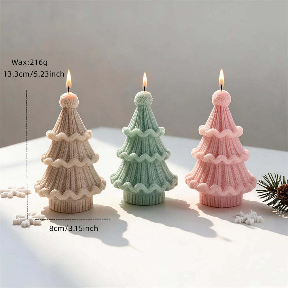 Ribbed knit Christmas tree candle measuring 13.3 centimetres tall